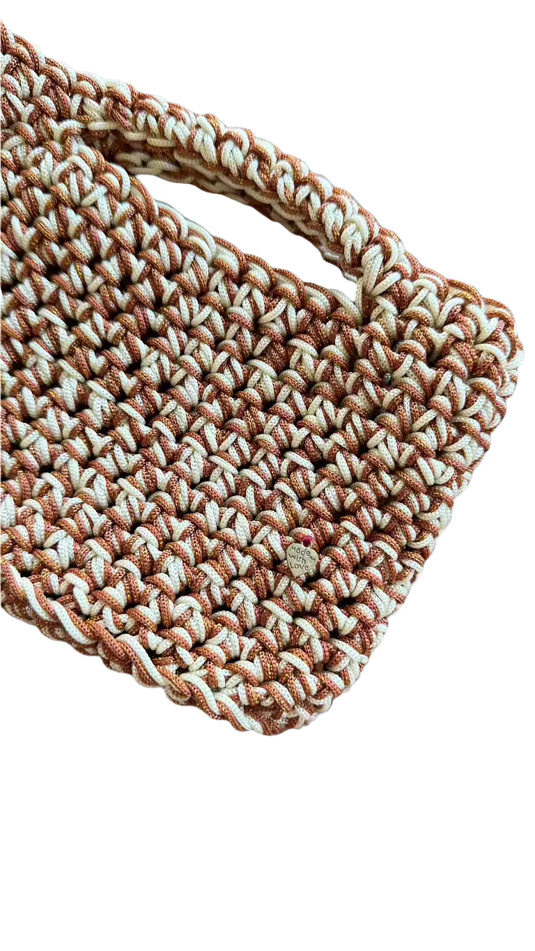 <img ="creaturina_bag.png" alt="Agostina mini bag panna e sparkling rame">
