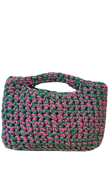 <img ="creaturina_bag.png" alt="Maggina mini bag rosa e verde">