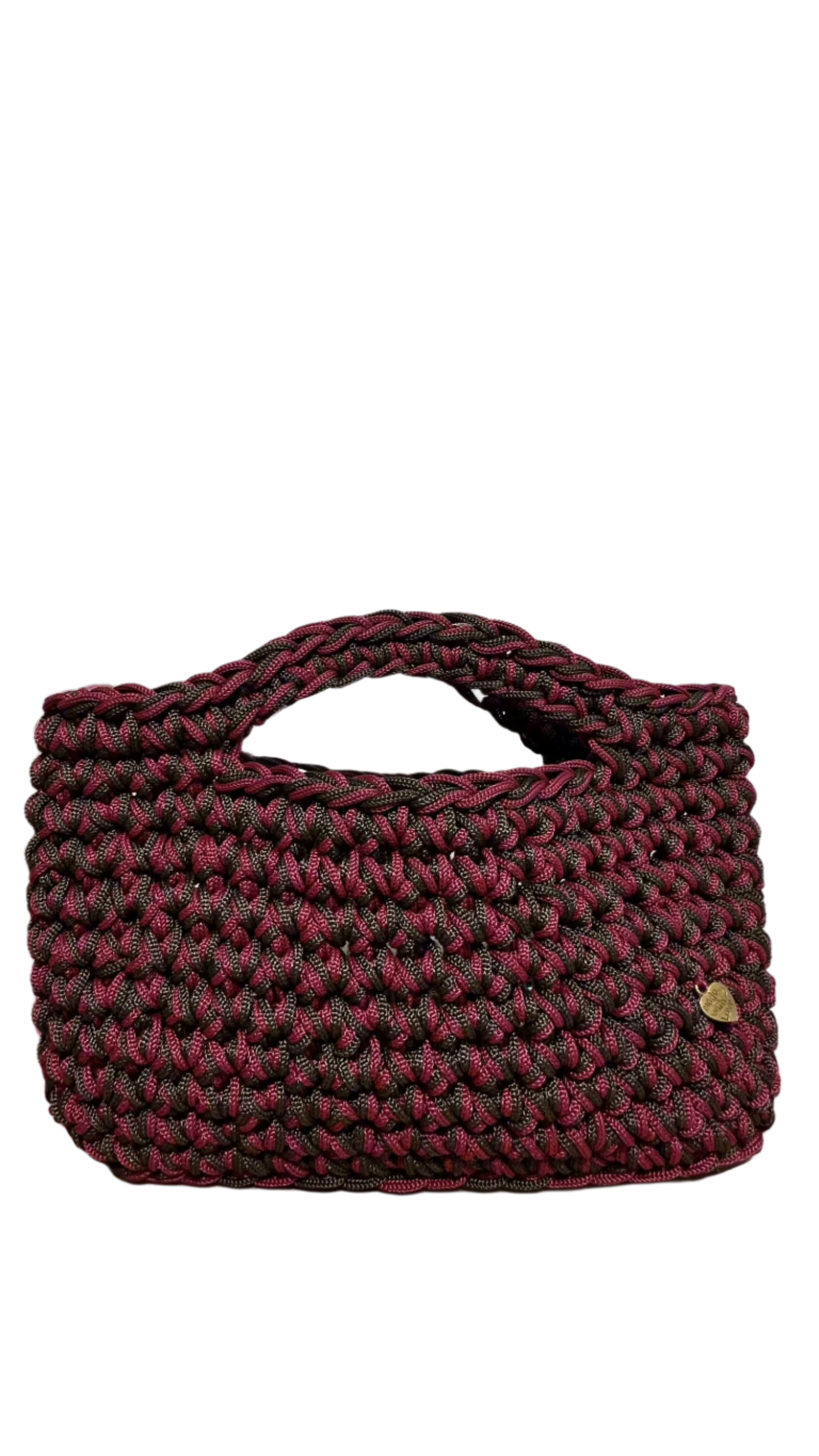 <img ="creaturina_bag.png" alt="Ottobrina mini bag verde fango e rosso mosto"